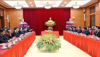 Senior Party official welcomes Lao provincial delegation